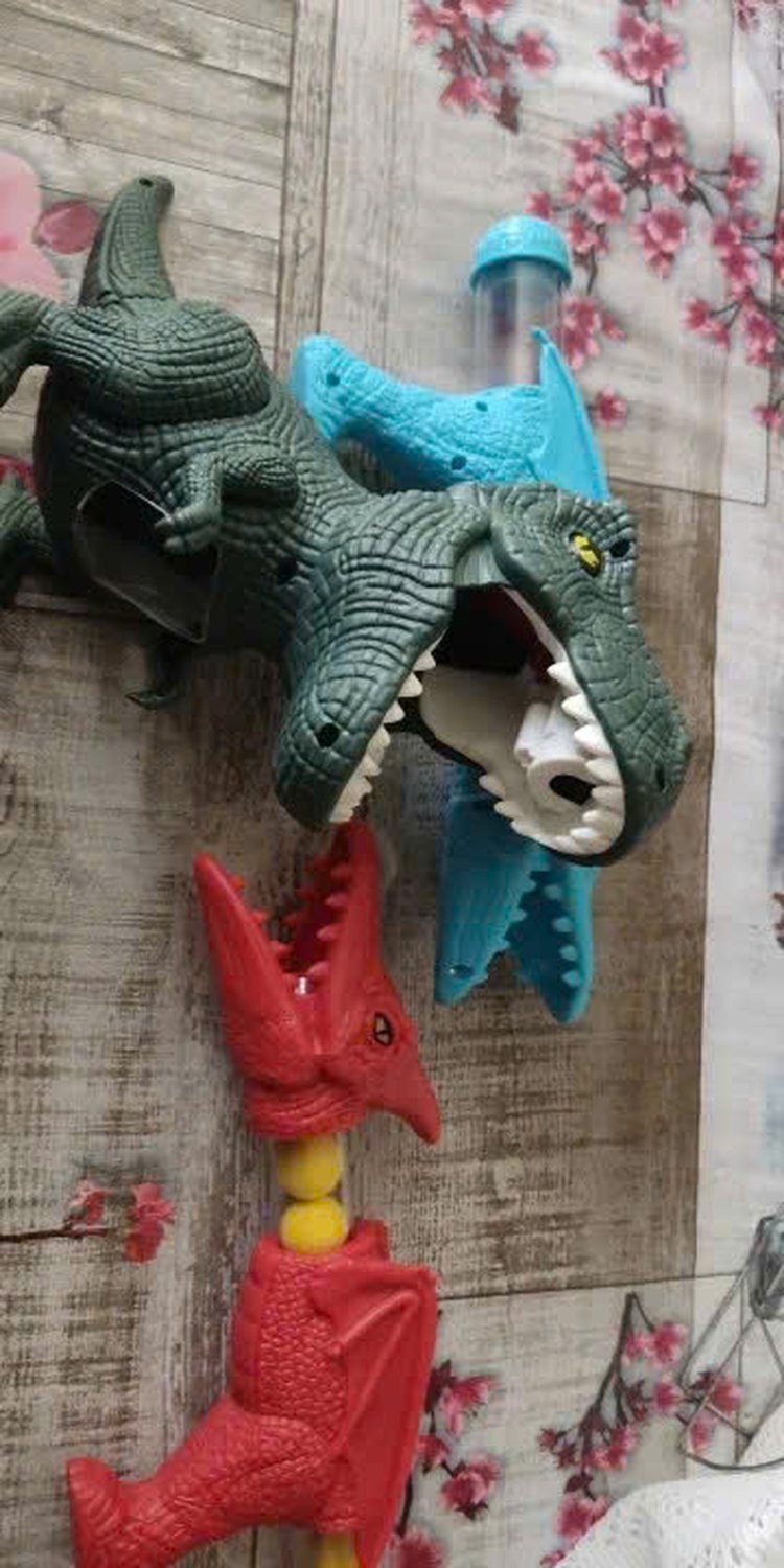 Dinosaur Shooting Toy with Sound, Lights, and Mist Spray Mode, Safe for Ages 3+