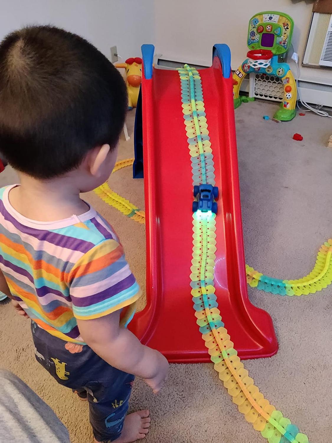 Flexible Race Track Car Toy with Easy Track Assembly and LED Light-Up Car, Safe for Ages 3+.