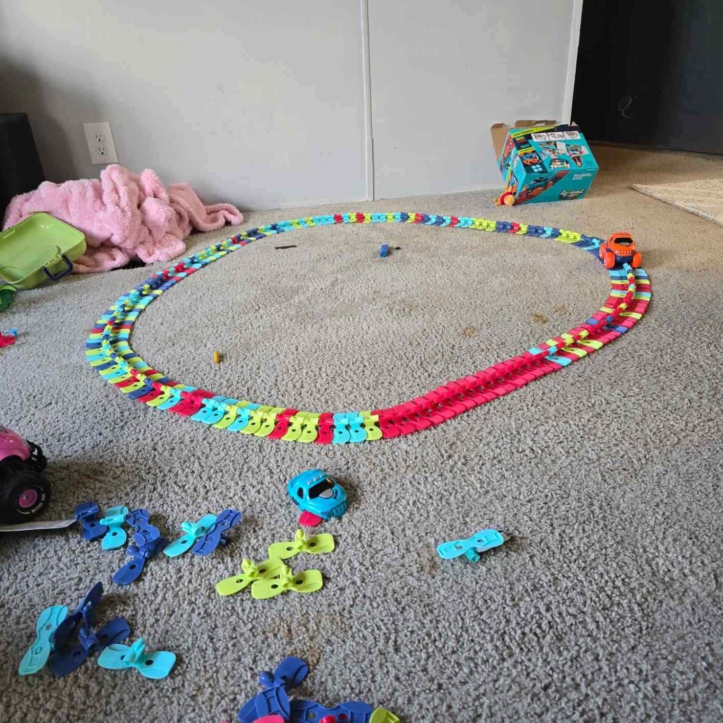 Flexible Race Track Car Toy with Easy Track Assembly and LED Light-Up Car, Safe for Ages 3+.